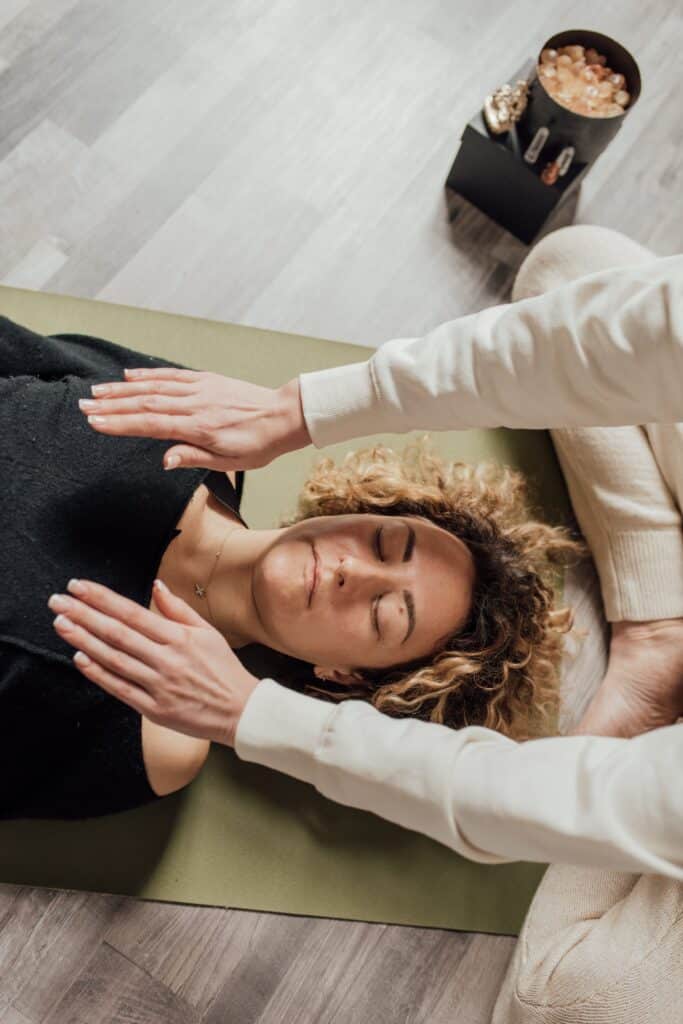 6998275-6998275-1 Woman Lying on the Floor Having Therapy